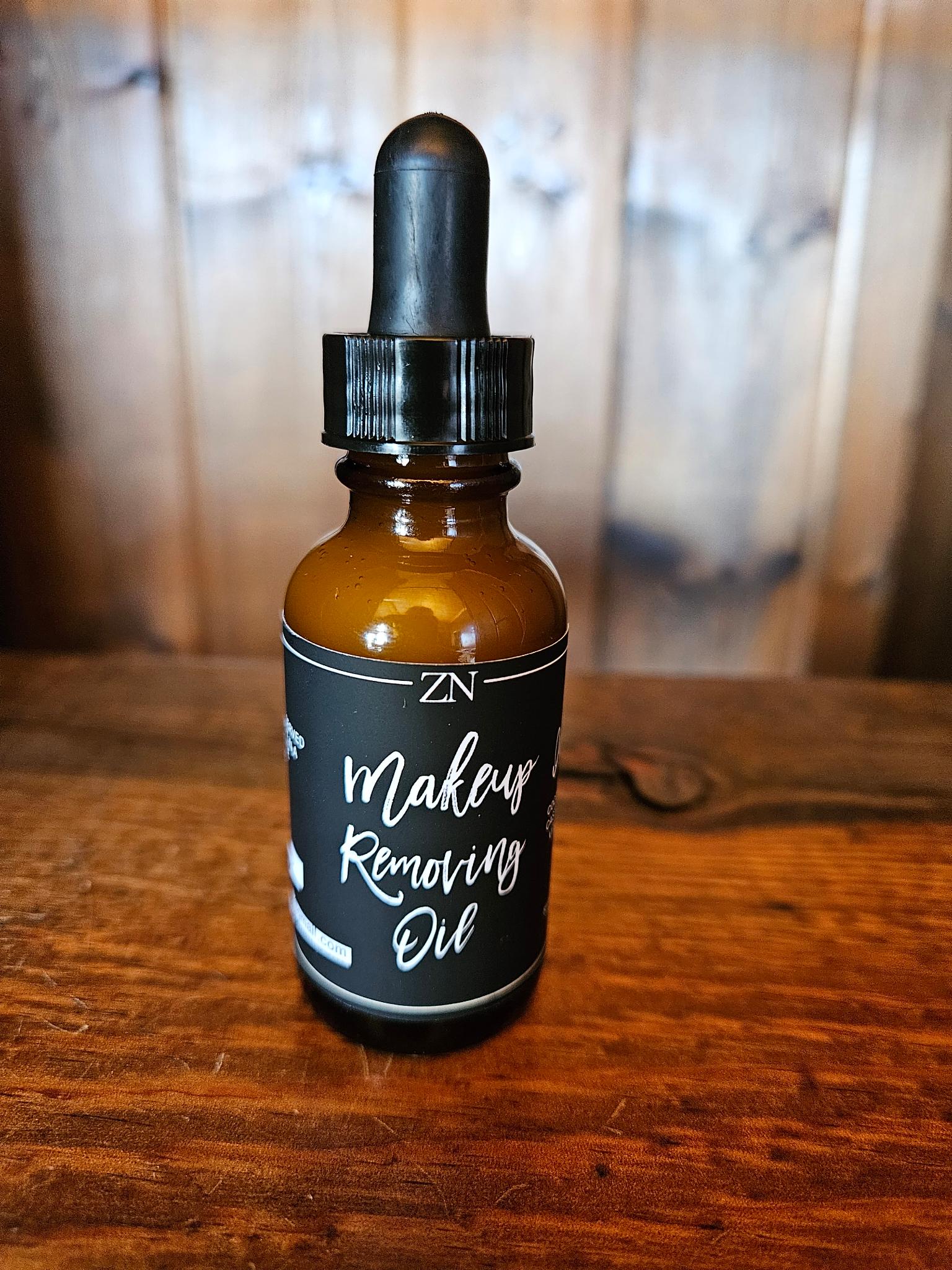 Natural oil-based makeup remover with rose water, jojoba oil, and coconut oil